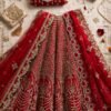 Crimson red raw silk bridal lehenga choli with heavy zardozi and dabka work by NoorNoorani